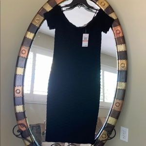 Fitted Michael Kors black cocktail dress.